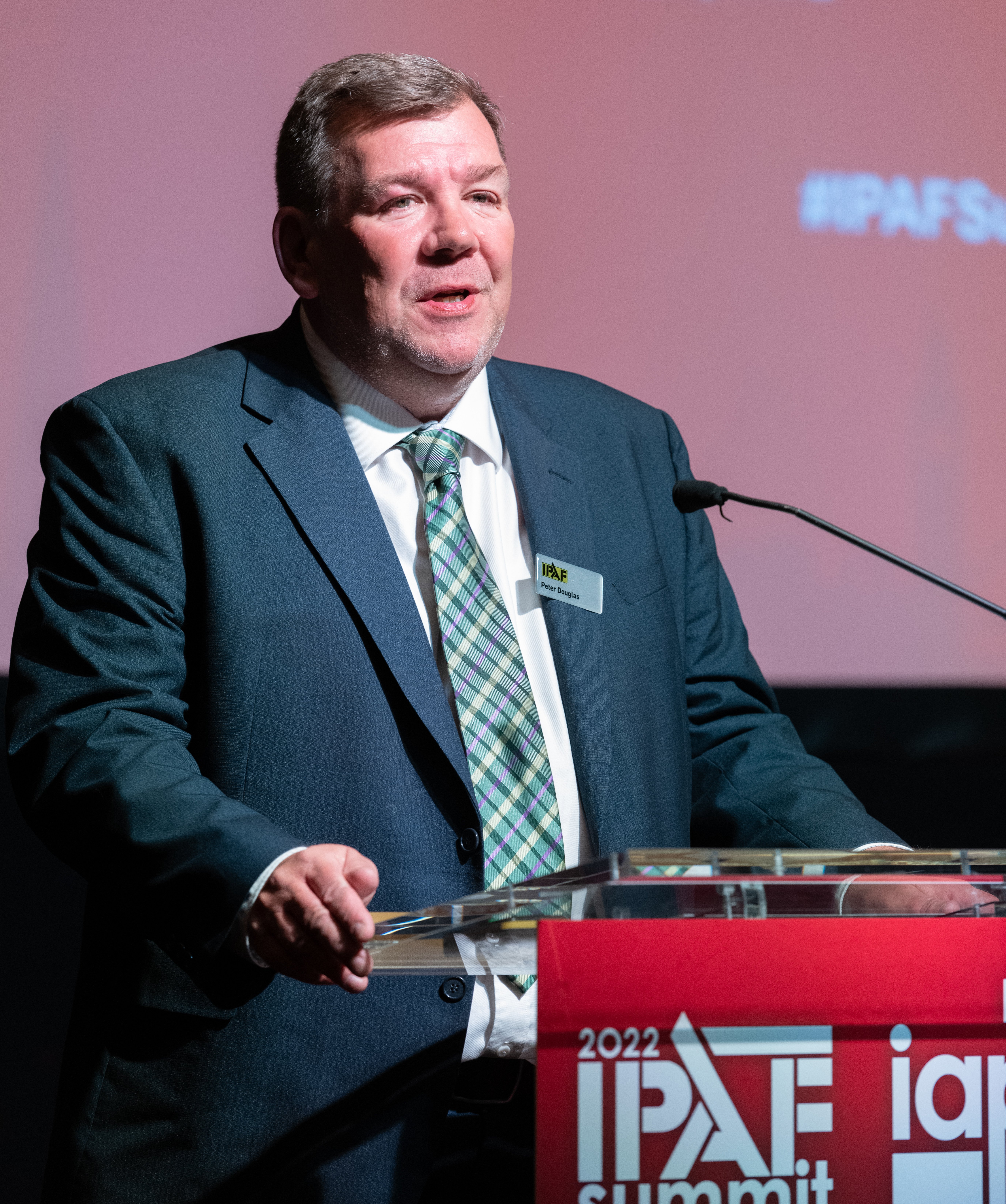 Peter Douglas welcomes delegates to IPAF Summit 2022